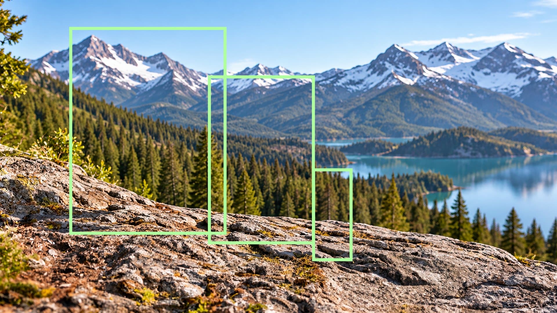The same mountain ledge with three bounding boxes marking where the hiker, dog, and water bottle go